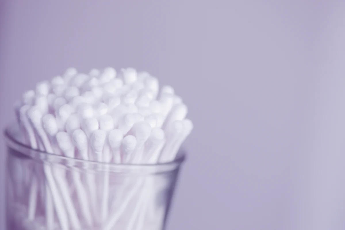 clean your iron steam holes with cotton swabs