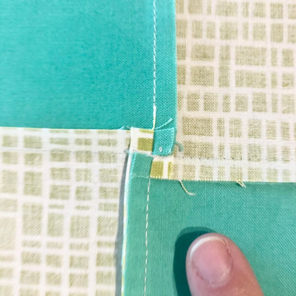 open the stiches between the two original seams