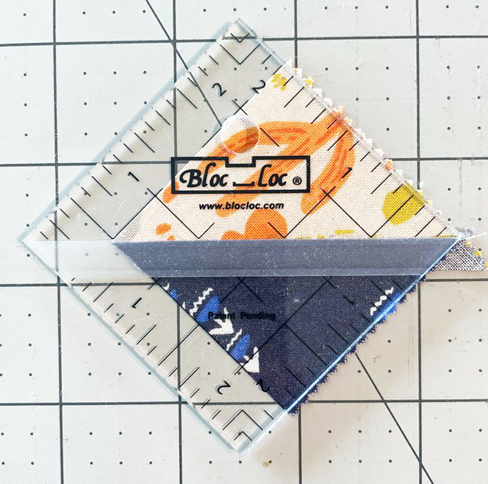 use the bloc loc ruler to align the center groove on the center seam